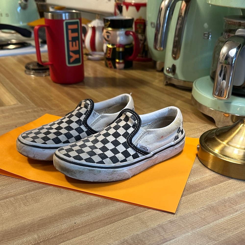 Vans Black and White Checkered Slip-Ons